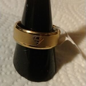 Gold tone steel wedding band ring size 9 Superman design (sku 125)